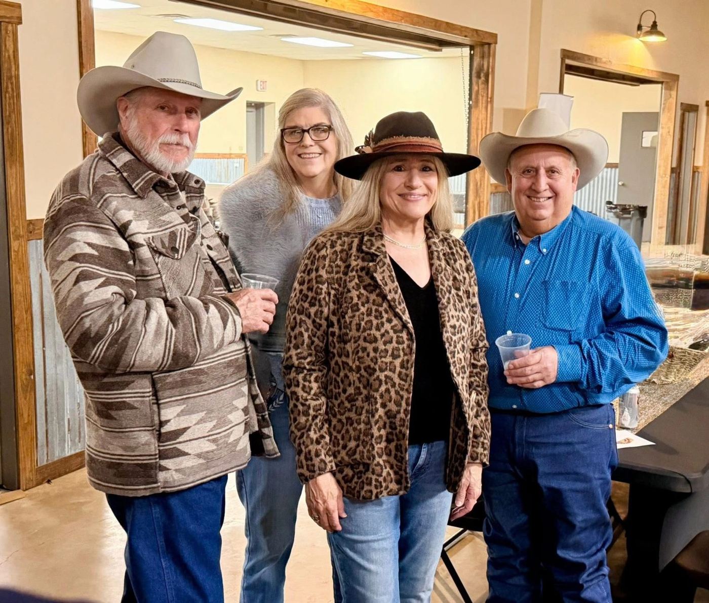 Four friends in western wear