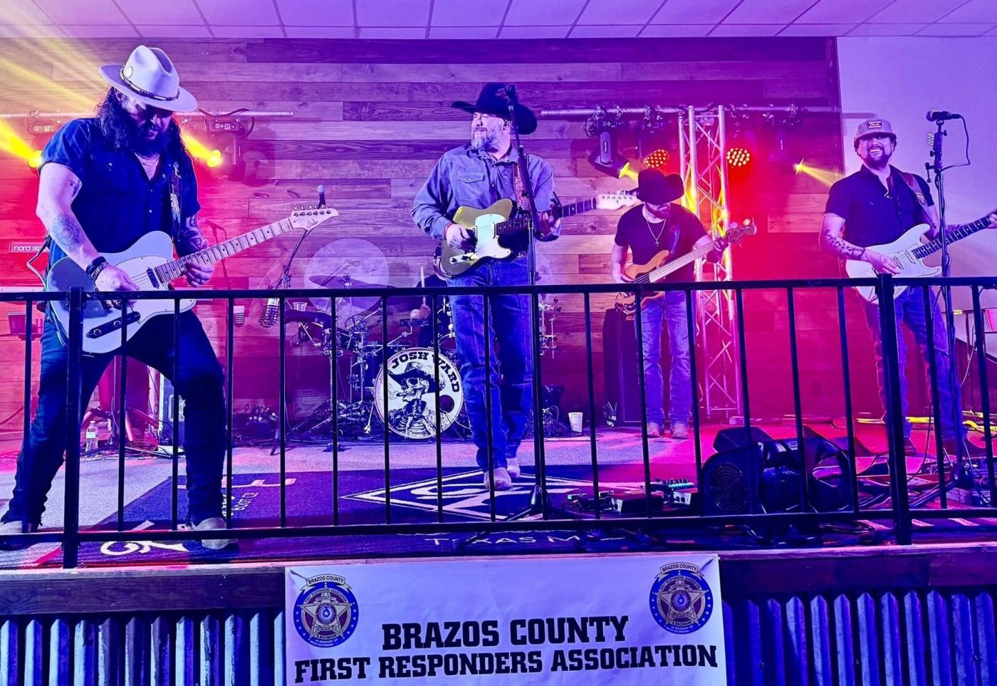 Live band on stage under a Brazos County First Responders Association banner